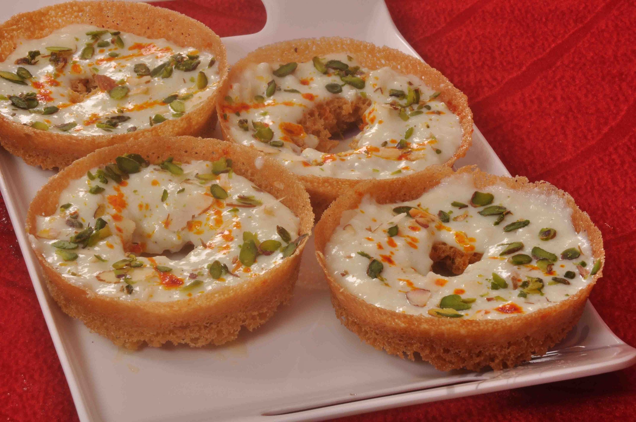 Indulge in home-made Ghevar this Makar Sankranti!