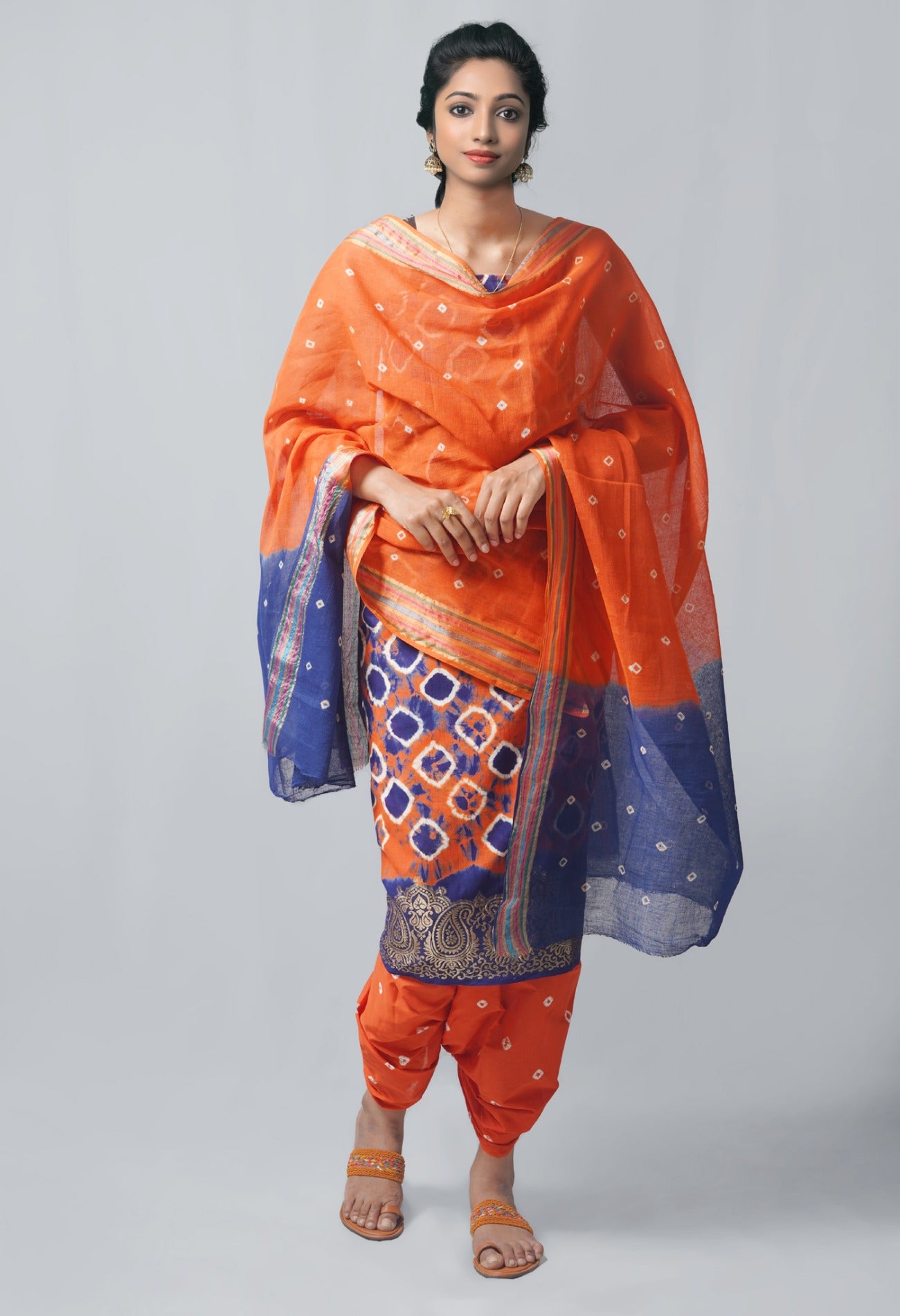 Online Shopping for Unstitched Orange-Navy Blue Pure Bandhani Cotton Salwar Kameez –PR8756 with Tie and Dye Bandhani. from Rajastan at Unnatisilks.com India
