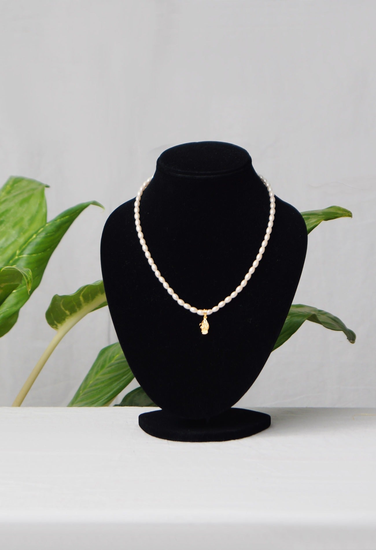 Online Shopping for White Amravati Oval Pearls Beads with Micro Gold Plated Pendant with jewellery from Andhra Pradesh at Unnatisilks.com India