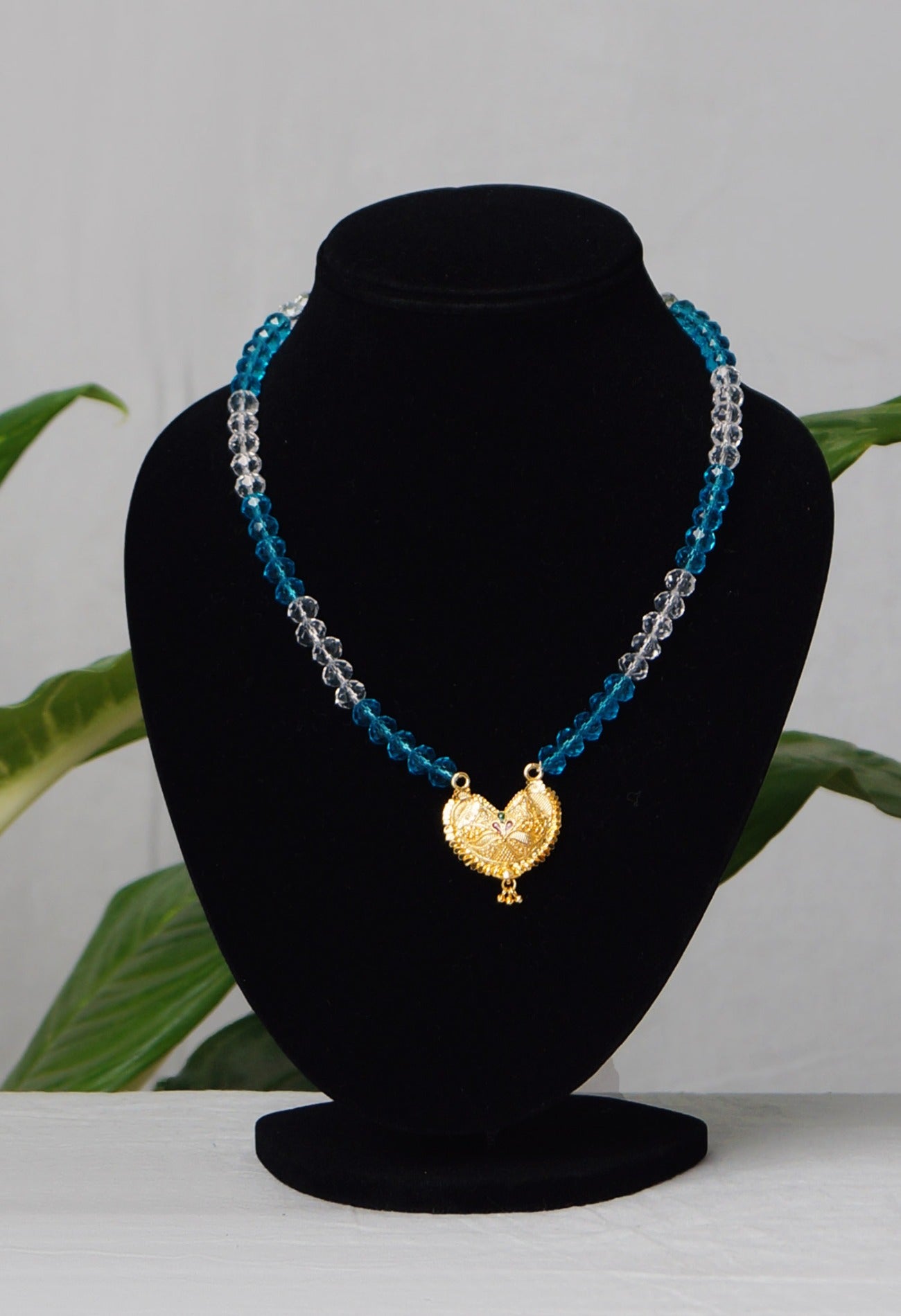 Buy White Amravati Crystal Beads with Micro Gold Plated Pendant