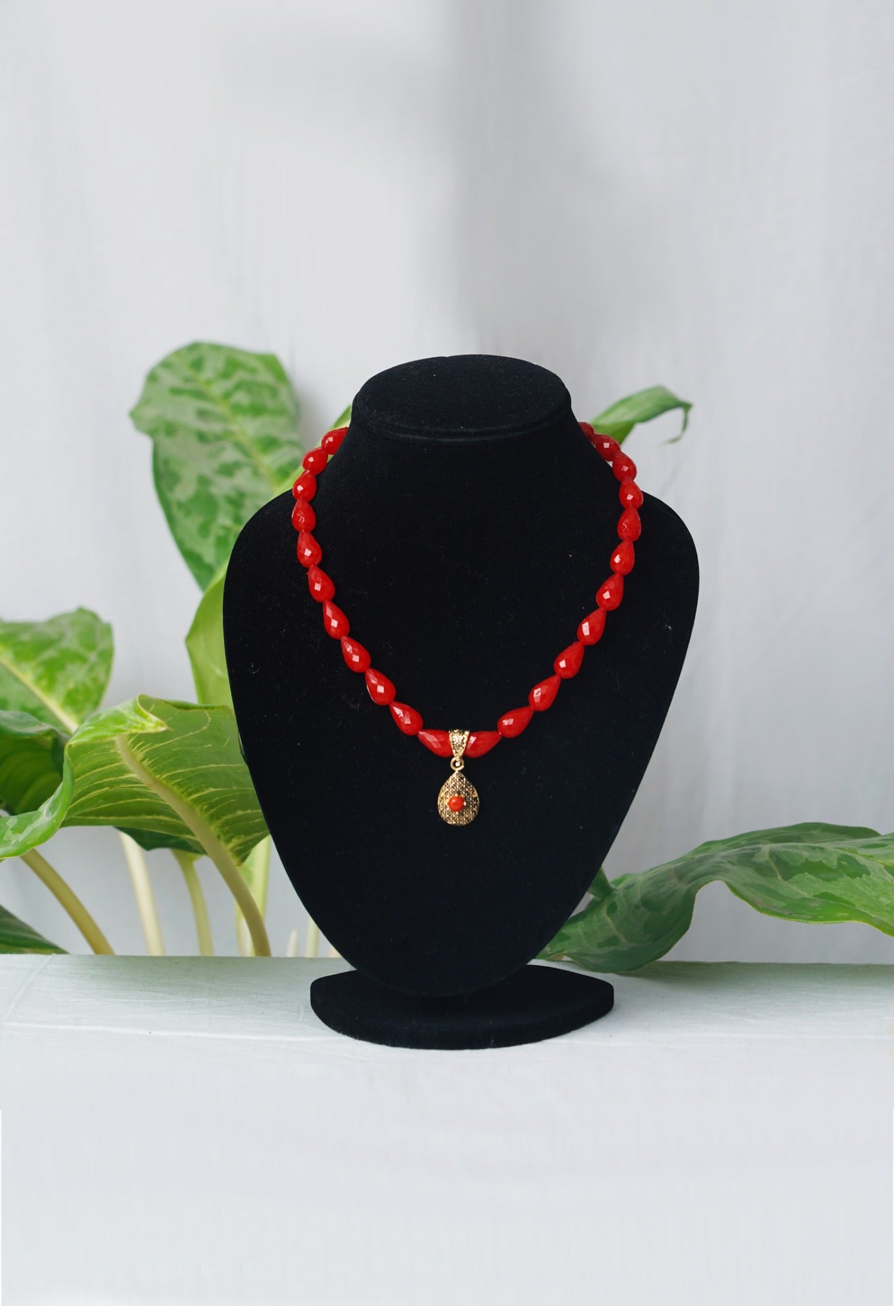 Online Shopping for Red Amravati Oval Long Pearl Beads with Pendent with jewellery from Andhra Pradesh at Unnatisilks.com India
