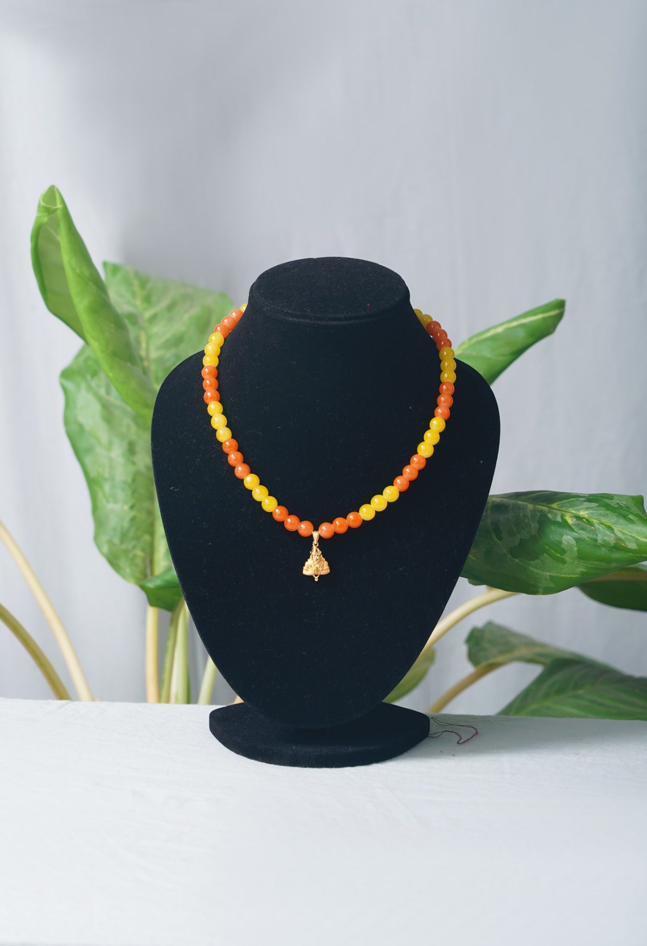 Online Shopping for Yellow and Orange Amravati Round Beads Necklace with Pendent with jewellery from Andhra pradesh at Unnatisilks.com India