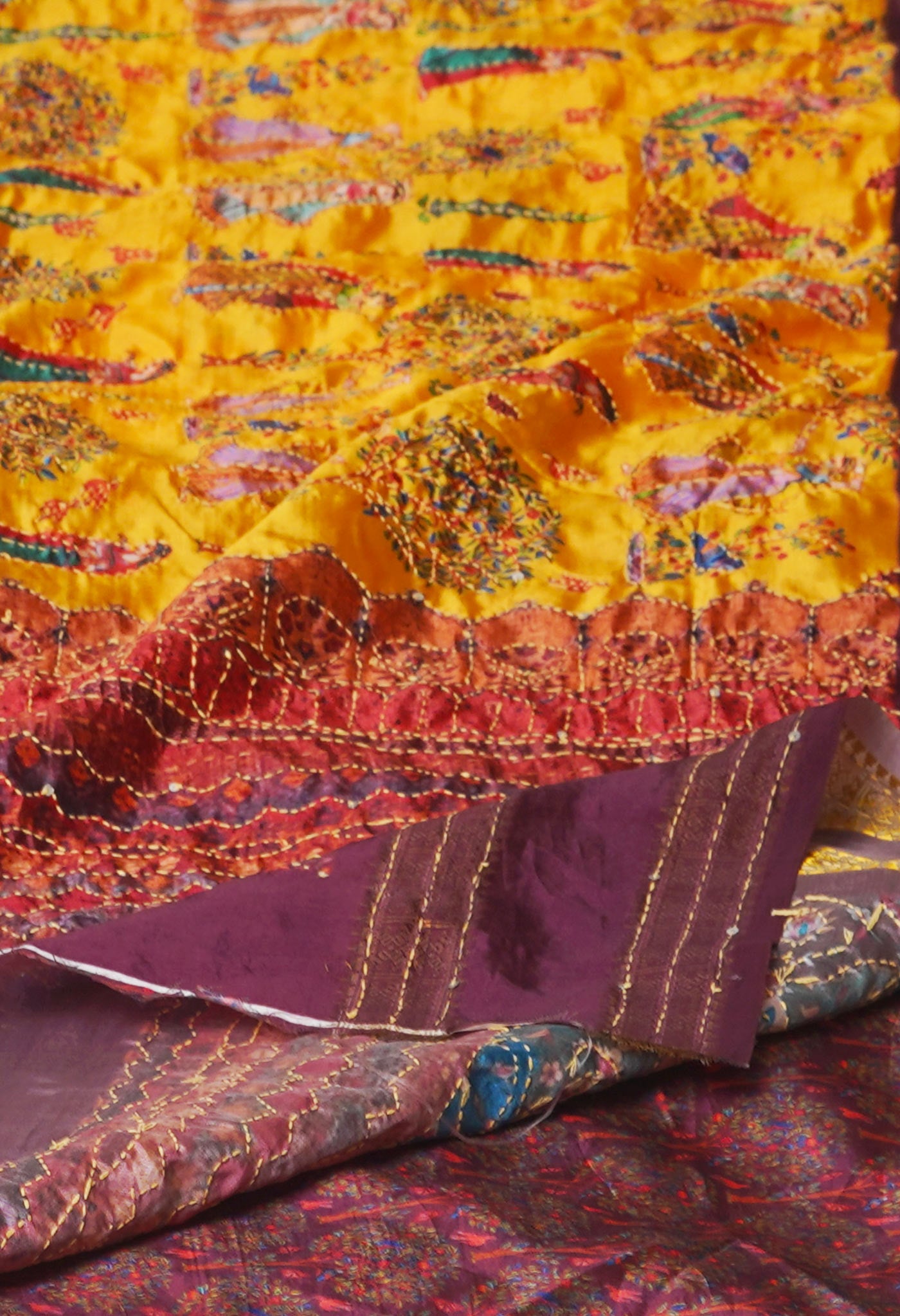 Yellow Kalamkari Printed Soft Silk Saree With Chips,Pichwai and Hand Kantha work
-UNM71462