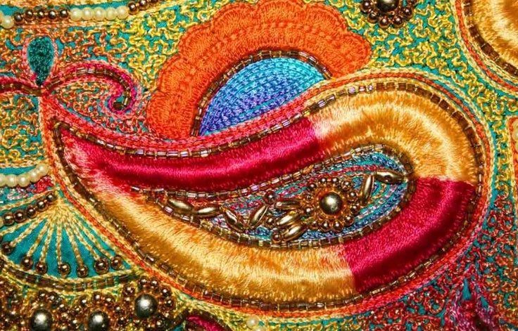 Aari embroidery with fine chain stitches and embellishments on a silk fabric