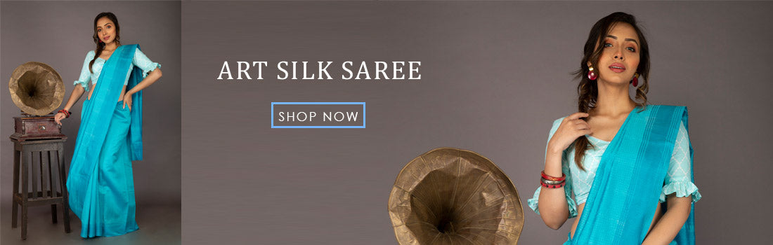 Woman draped in elegant Art Silk Saree at festive occasion