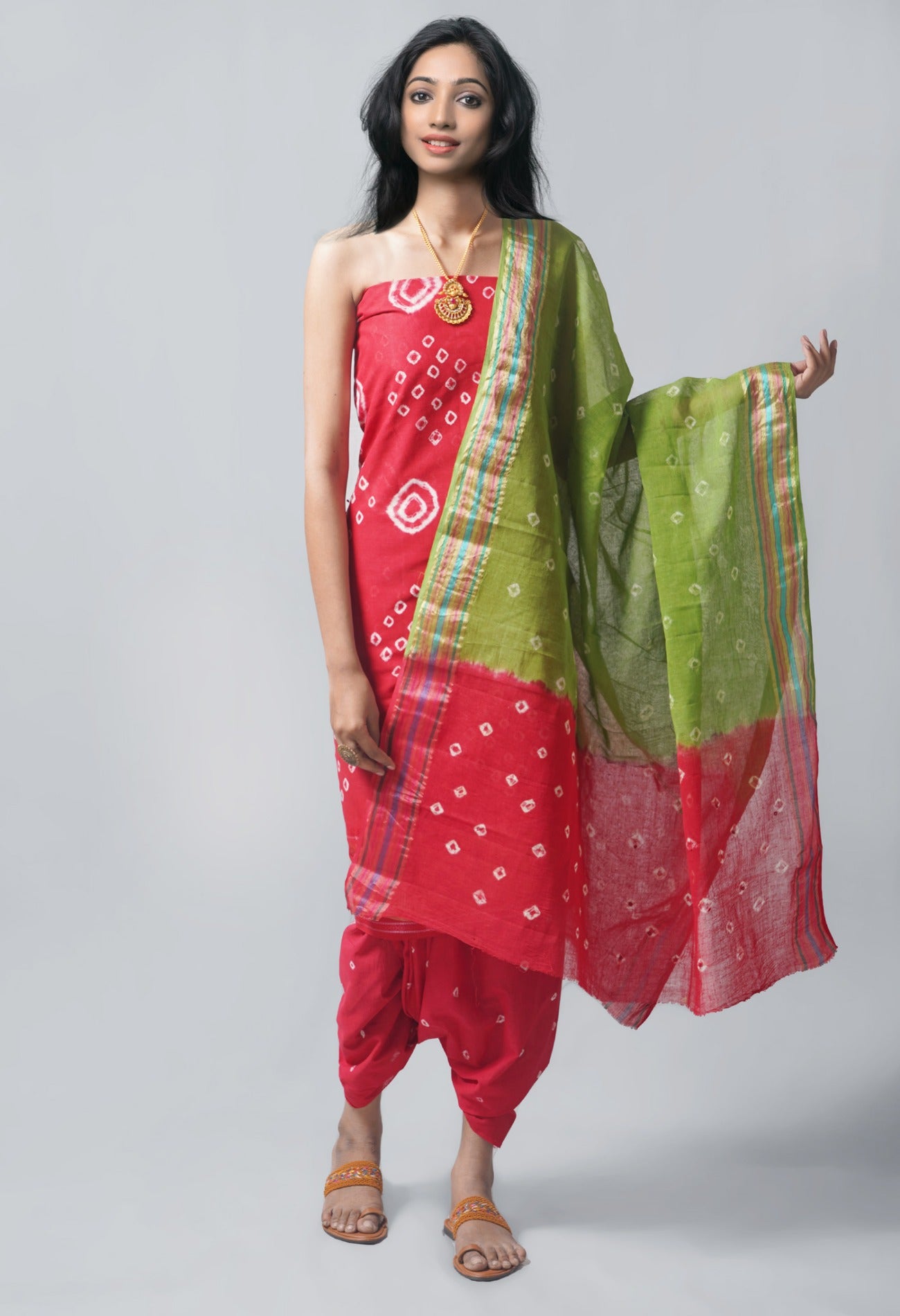 Online Shopping for Unstitched Red-Green Pure Bandhani Cotton Salwar Kameez –PR8829 with Tie and Dye Bandhani. from Rajastan at Unnatisilks.com India
