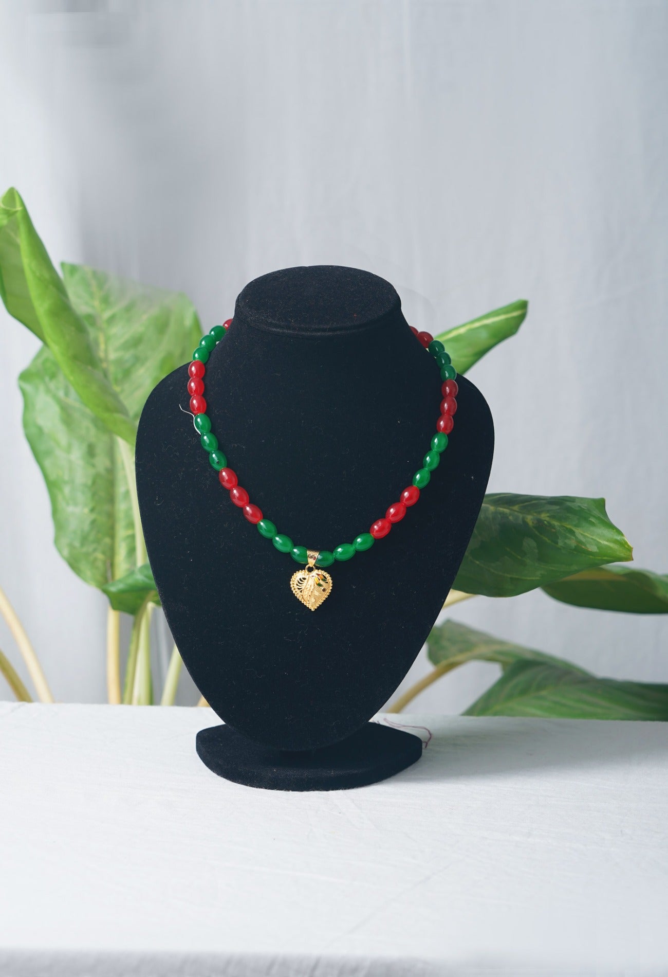 Online Shopping for Red and Green Amravati Oval Beads Necklace with Pendent with jewellery from Andhra pradesh at Unnatisilks.com India
