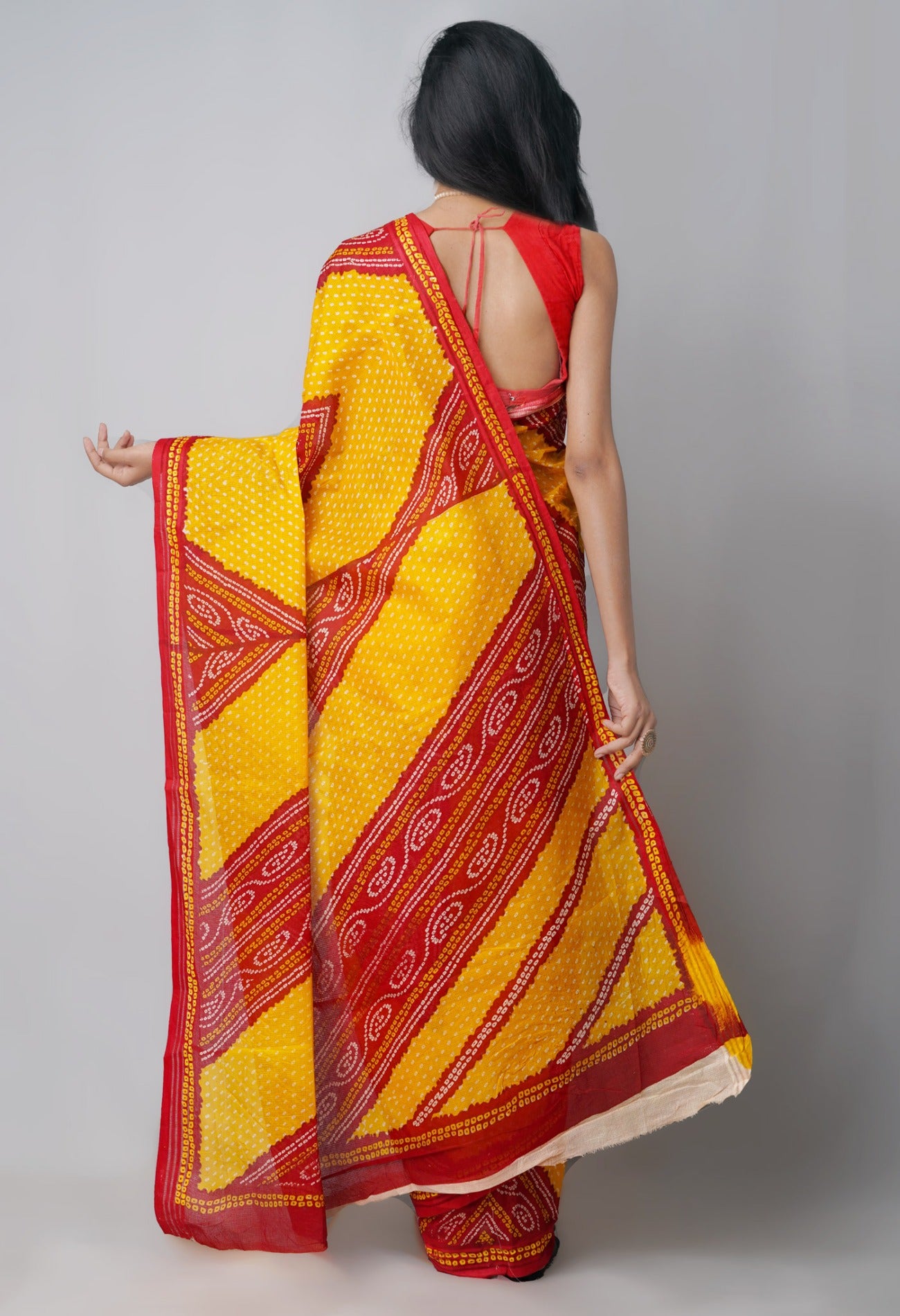 Online Shopping for Yellow Pure Kota With Bandhni Prints Cotton Saree with Fancy/Ethnic Prints from Rajasthan at Unnatisilks.com India
